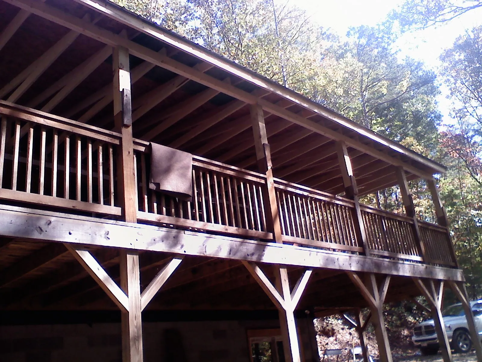 Timber framing under a new elevated porch and deck — Roof Leak Repair in Forest City by Roofing Brothers